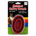 Rubber curry brush for dogs in packaging with brand name 'Four Paws'.