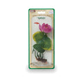 Packaged artificial water plant with pink flower and green leaves on a white background