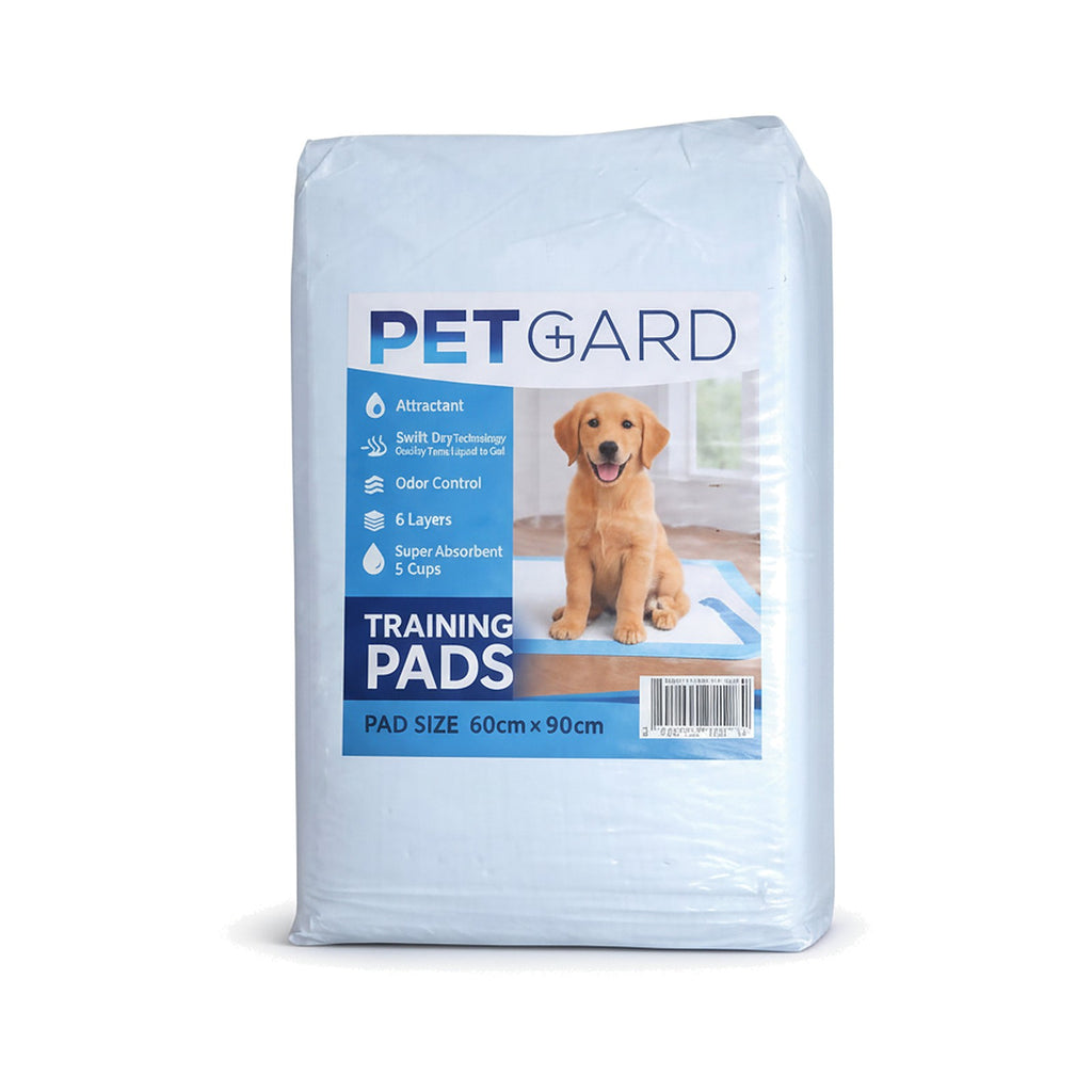 Bag of Petgard training pads with a dog on the label on a white background