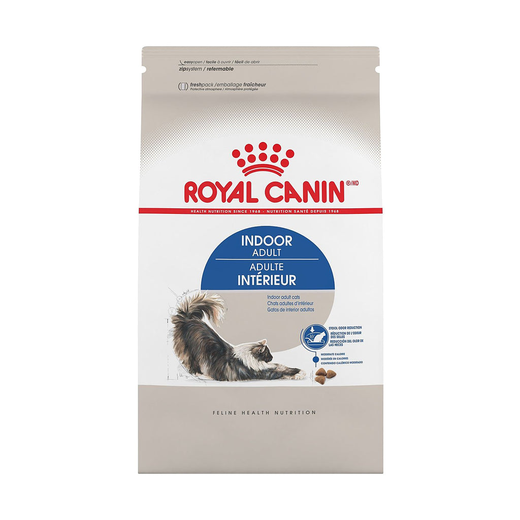 Bag of Royal Canin Indoor Adult cat food with beige and white packaging, blue accent panel, and a cat image