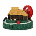 Packaged-style product image of a water mill aquarium ornament with a brown thatched-roof house, large red wheel, green rocky base, and red front steps on a white background.